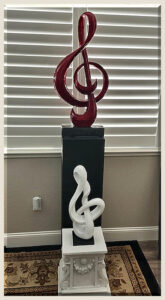 Read more about the article Red & White Treble Cleff Sculpture